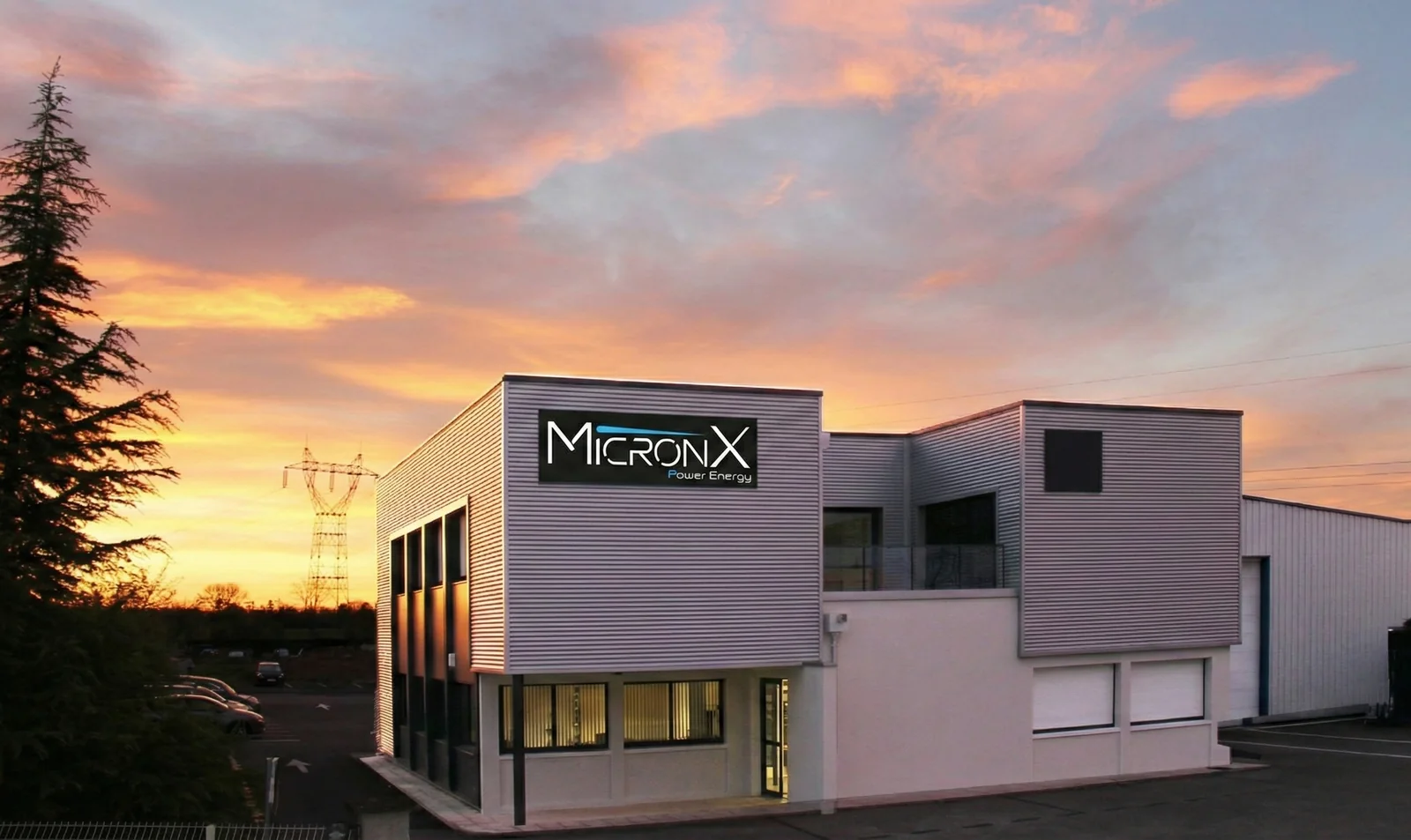 Micronics Systems headquarters in Villette-d'Anthon, France, with the MicronX Power Energy sign